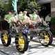 Illustration for article titled People-Powered Quadcycle Makes Stop At Woodward On Way To Burning Man